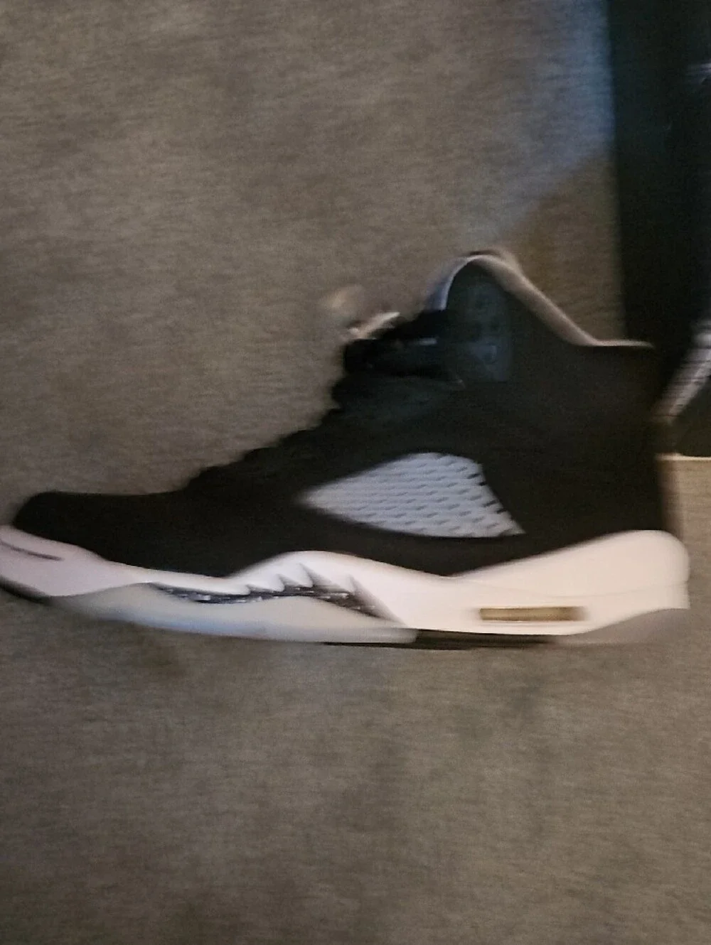 Jordan Men’s Mid-Top Sneaker in Black and White